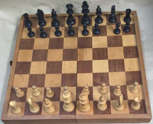 32 cms square chess board, folds to box that acts as storage