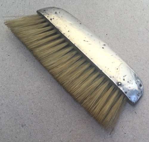 Hallmarked silver clothes brush