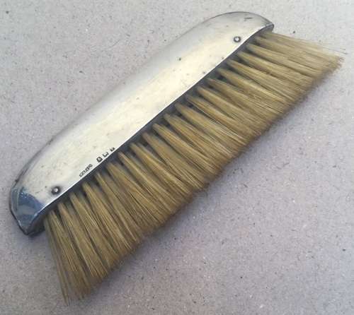 Hallmarked silver clothes brush