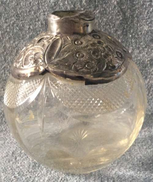 Silver top bottle, damaged, for display as too good to toss out