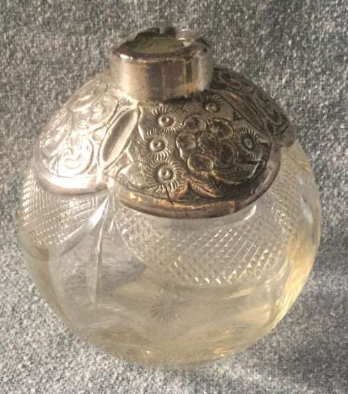 Silver top bottle, damaged, for display as too good to toss out