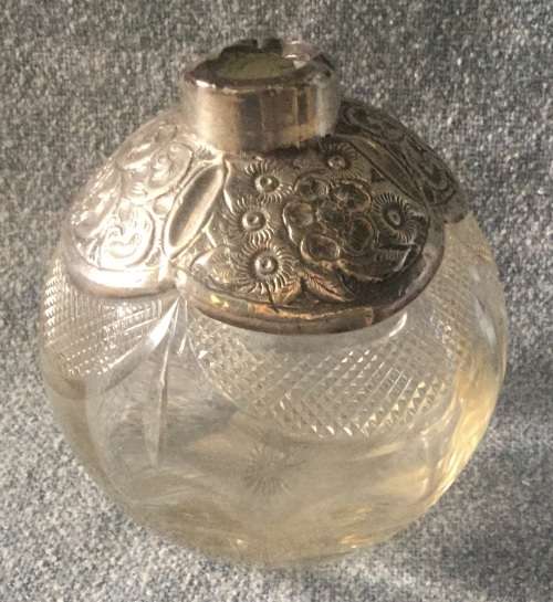 Silver top bottle, damaged, for display as too good to toss out