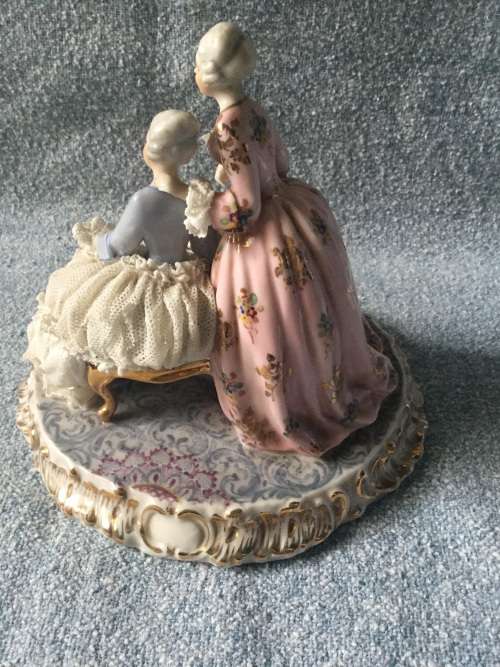 Dresden style made in Italy ornament. There are losses.