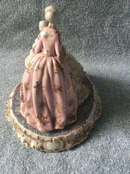 Dresden style made in Italy ornament. There are losses.