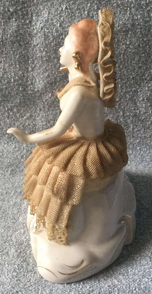 Dresden style ornament that does have the usual losses