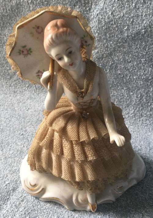 Dresden style ornament that does have the usual losses