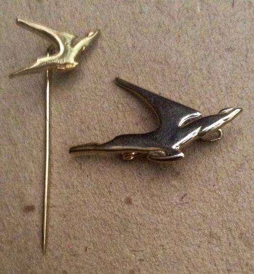 One Pin and One Badge from SAA.   Postage R25.00
