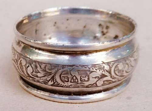Sterling silver napkin ring...vacant cartouche....diameter 4cms...width 2 cms