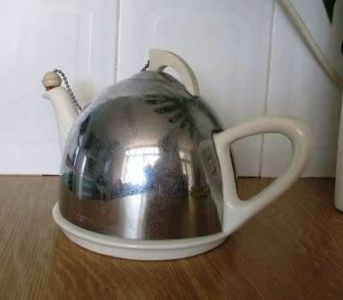 Art Deco Tea Pot with Insulated Cover and Spout Bang. Bakelite Handle, England. App 27L x 16cms high
