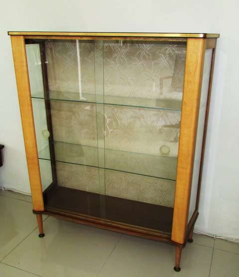 Glass Display Cabinet Circa 1960. Glass shelving. Approximately 90l x 30w x 110 cms high