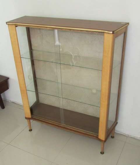 Glass Display Cabinet Circa 1960. Glass shelving. Approximately 90l x 30w x 110 cms high