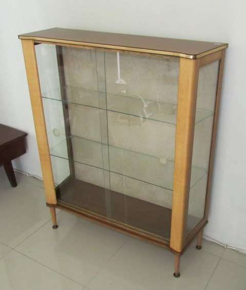 Glass Display Cabinet Circa 1960. Glass shelving. Approximately 90l x 30w x 110 cms high