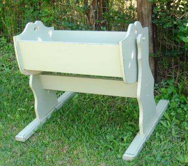 Rocking crib approximately 75cm long x 61cm wide x 64cm high