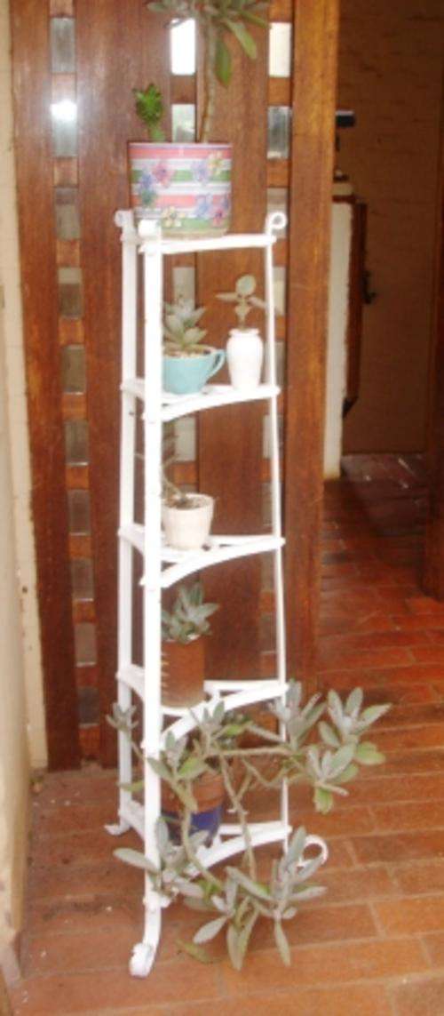 Retro cast iron pot and ladle holder.(excluding pot plants)Approx. 104cmh x 40w