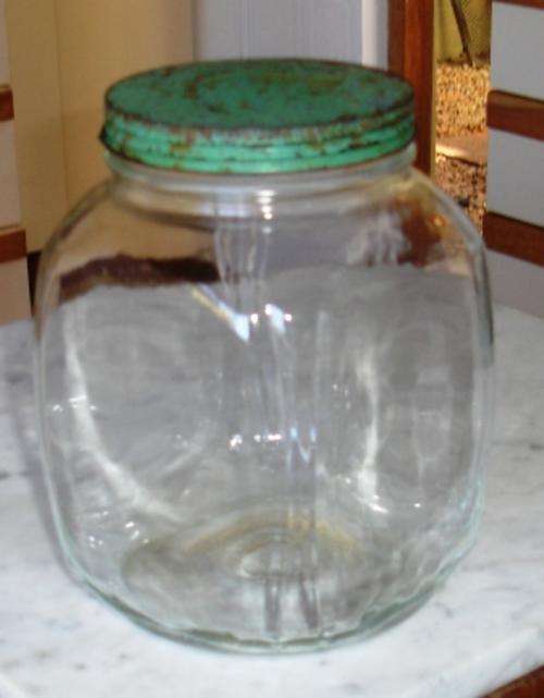 Retro storage bottle.(very unusual with rounded corners.approx. 23cmh  x 15 x 15