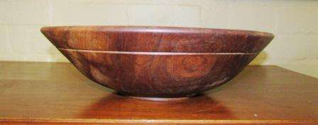 Large wooden bowl hand carved out of single piece of wood. Approx. 36cmd x 10h