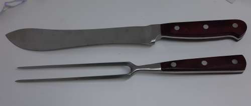 Carving set with Wood Handles. Knife approximately 34 cms long