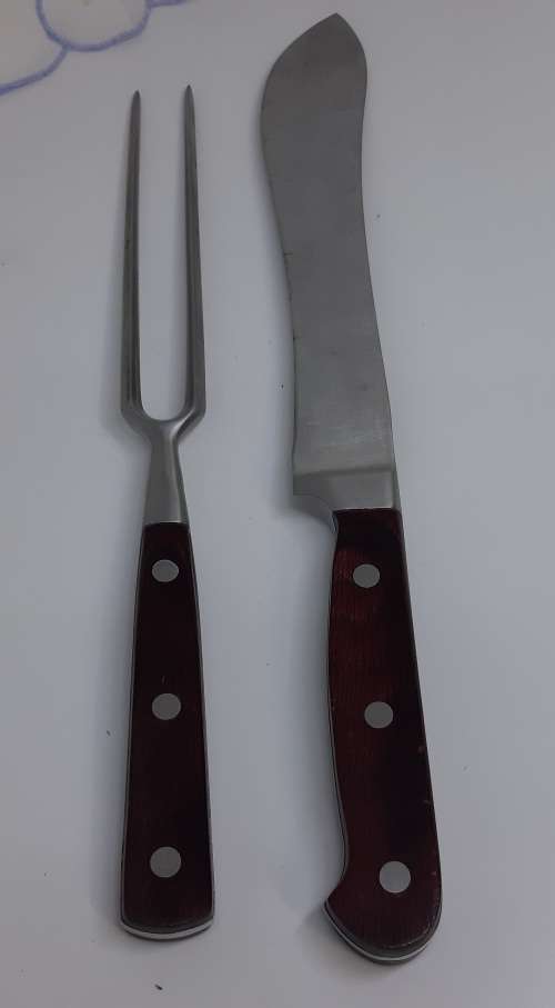 Carving set with Wood Handles. Knife approximately 34 cms long