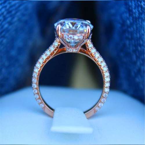Ladies oval 5Cts Zircon Rose gold Ring, embellished with small zircons