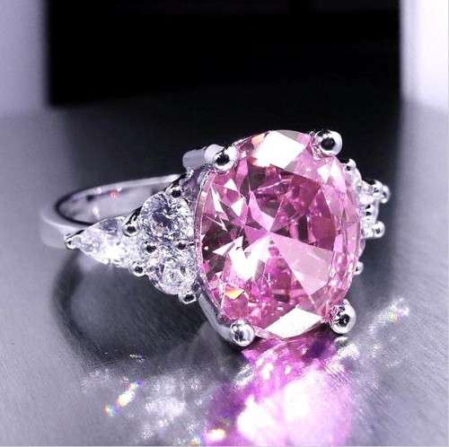 Elegant Pink Oval Crystal Ring with side stones Silver