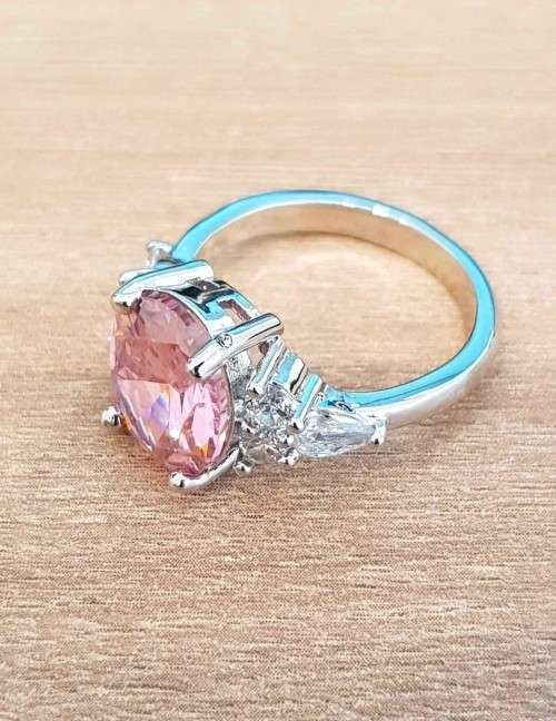 Elegant Pink Oval Crystal Ring with side stones Silver