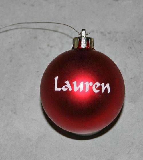 Personalized Christmas baubles. One name per bauble.