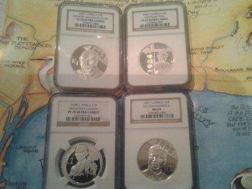 NOBEL LAUREATES 4 GRADED COINS