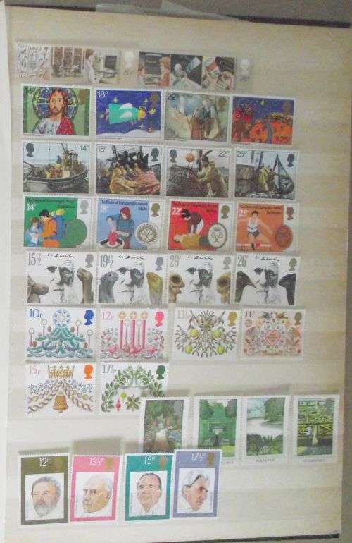 1980's GREAT BRTIAIN QE II MINT NEVER HINGED SETS x 20 DIFFERENT SETS ON 4 PAGES