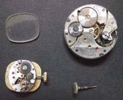 1929 -1935 OMEGA POCKET WATCH MOVEMENT BY RANDLES DURBAN and LLOYDS LADIES WATCH MOVEMENT FOR SPARES