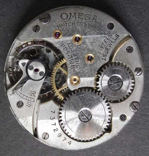 1929 -1935 OMEGA POCKET WATCH MOVEMENT BY RANDLES DURBAN and LLOYDS LADIES WATCH MOVEMENT FOR SPARES