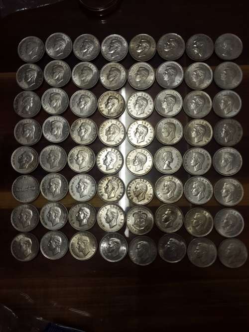 MAGNIFICENT COLLECTION OF 64 HIGH GRADE UNION CROWNS.