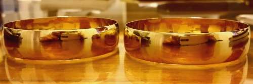 MAGNIFICENT 16 mm SOLID 9 ct GOLD BANGLES . A HEAVY 42 GRAMS OF SOLID 9 ct !!!!! INSIDE WIDTH 63 MM