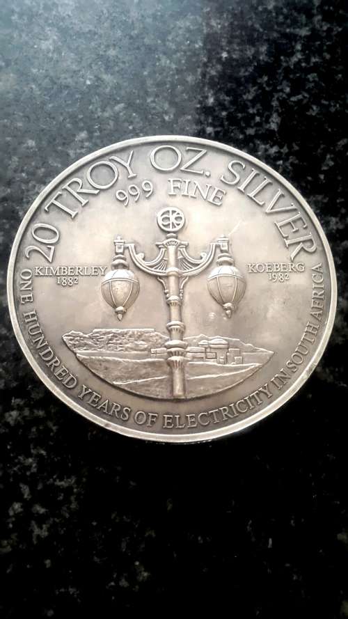 20 TROY OUNCES OF 999 PURE SILVER. 100 YEARS OF ELECTRICITY IN SA . WEIGHT 622 GRAMS 999 SILVER