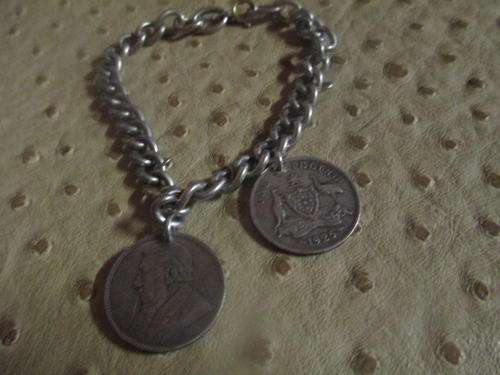 SOLID STERLING SILVER BRACELET WITH TWO STERLING SILVER COINS