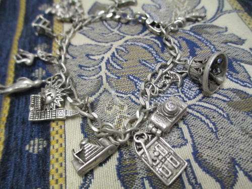 ANTIQUE STERLING SILVER CHARM BRACELET WITH STUNNINGLY HAND CRAFTED LARGE CHARMS