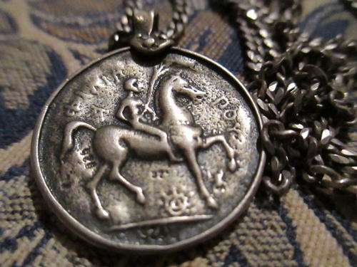 ANTIQUE MEDALION PLUS STERLING SILVER CHAIN.- 20.2 GRAMS STERLING