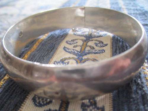 LARGE ENGRAVED ANTIQUE STERLING DOME BANGLE.21.6 GRAMS STERLING. WIDTH 15 MM.