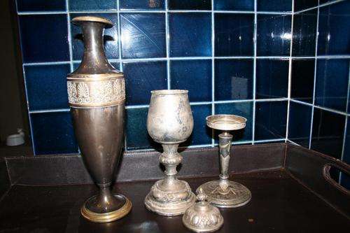 1 Vase 1 candles stick and a goblet with lid I am sure they can clean up well