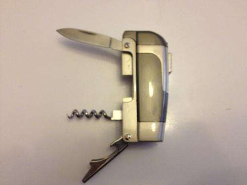 Camel Lighter ( With Swiss Army Knife Like Features )