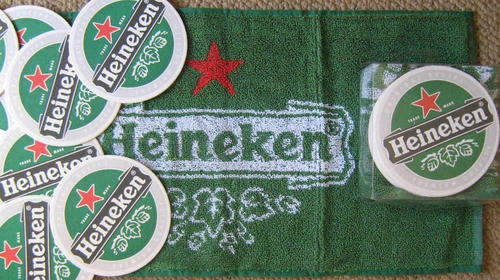 Heineken . Bar towel and 10 drink coasters