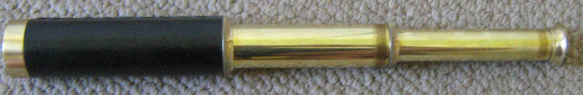 Telescope brass with leather overlay
