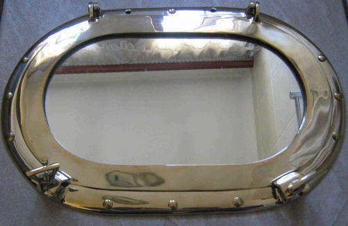 Porthole oval mirror, solid brass.                                                        nb6