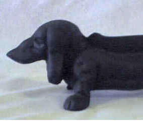 Cast iron foot scraper / door stop,