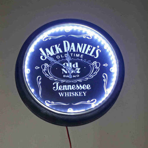 Jack Daniel`s illuminated clock. 40cm diameter.