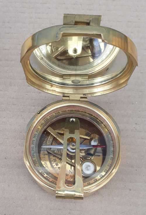 Brunton hexagonal heavy solid brass compass .