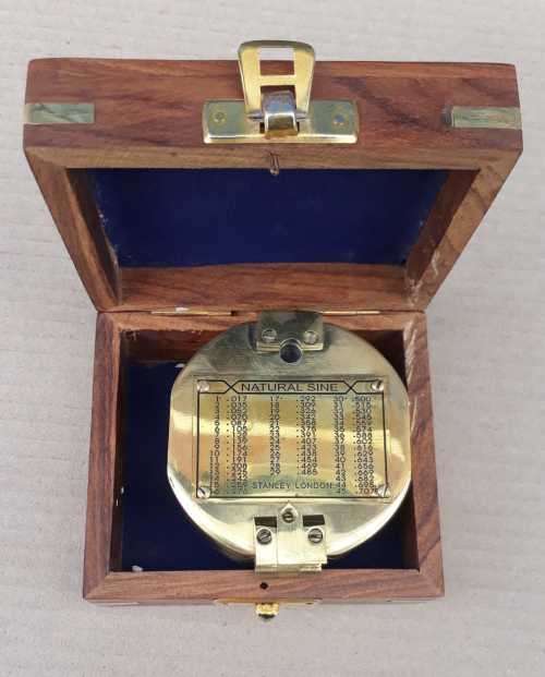 Brunton hexagonal heavy solid brass compass .