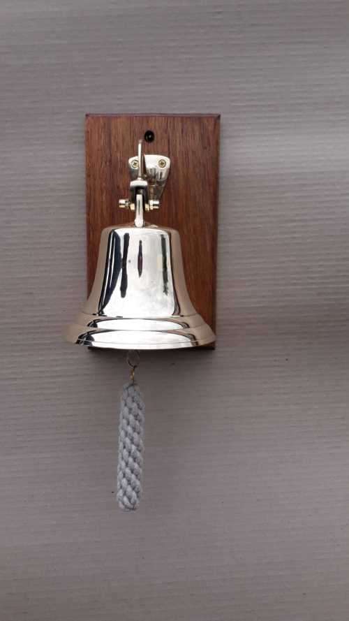 Solid brass ship, motivational bell 11,5cm diameter, sales bell. Wall mounted on solid wood