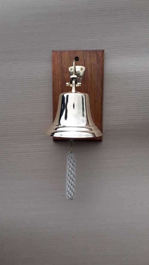 Solid brass ship, motivational bell 13,5cm diameter, sales bell. Wall mounted on solid wood