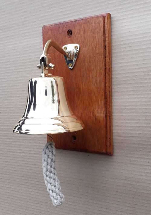 Solid brass ship, motivational bell 13,5cm diameter, sales bell. Wall mounted on solid wood