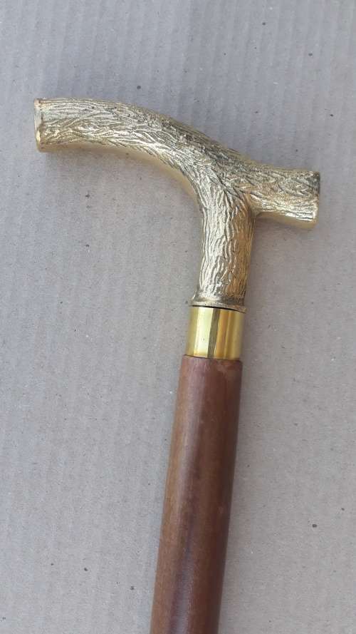 Walking stick. Rosewood with beautiful brass handle and rubber non slip bottom tip